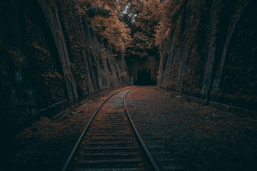Abandoned Railroad: Autumn's Whisper Through the Tunnel of Mystery