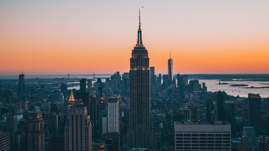 Urban Pulse: Empire State Silhouette at Golden Hour