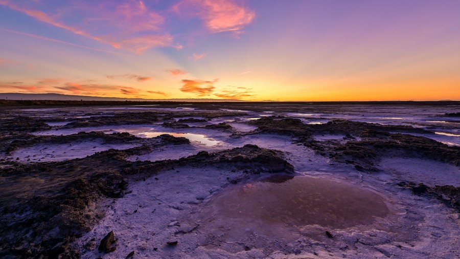 Ethereal Sunrise Over Salt Flats