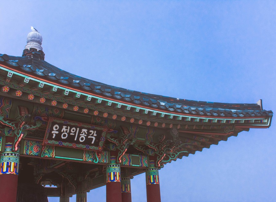 Elegance of Joseon Dynasty: Ornate Temple Architecture Under a Clear Sky