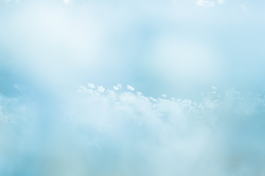 Serene Blue Skies: A Tranquil Gradient of Soft White Clouds