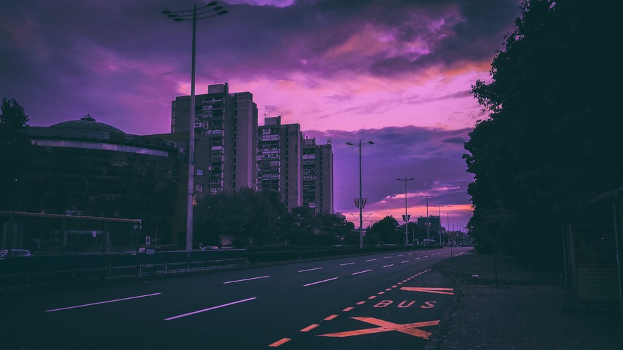 Twilight Urban Solitudes: A City's Purple Embrace