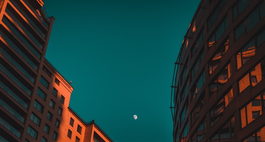 Urban Elegance at Twilight: Melting Skies and Modern Structures