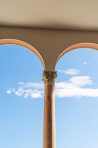 Ethereal Ascension: Majestic Stone Column Against a Vast Blue Sky - Cute Wallpaper