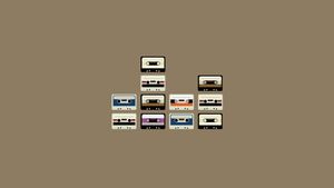 Retro Harmony: Collage of Vintage Cassettes in a Pyramid - Cute Wallpaper