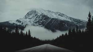 Solitary Journey: Enigmatic Mountain Pass - Cute Wallpaper